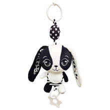 Load image into Gallery viewer, Black and white bunny hanging plush toy with a keychain on a white background good for a pram toy, baby gym toy or car toy