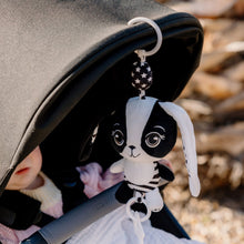 Load image into Gallery viewer, Billie the Bunny sensory toy clipped to baby car seat for on-the-go play
