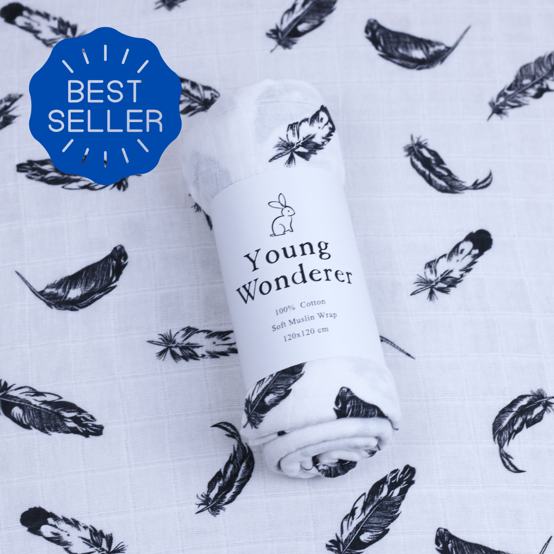 Young Wonderer soft muslin baby wrap with black feather print – 100% cotton swaddle, labelled Best Seller for newborn comfort and sensory appeal