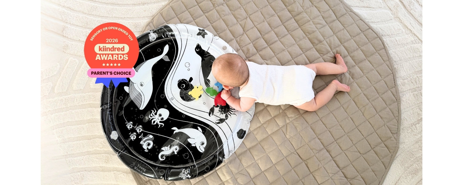 Black and white sensory water mat for babies. Supports tummy time, vision development & motor skills. 2026 Kiindred Parents' Choice Award winner.