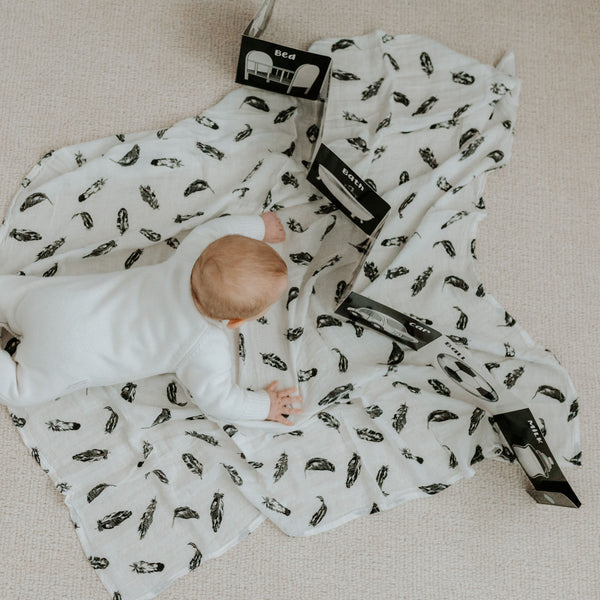 black and white muslin, black and white baby muslin wrap, baby muslin wrap, baby muslin australia, baby wrap australia, feather muslin, zebra muslin, panda muslin, snowflake muslin, winter muslin wrap, winter baby wrap, high contrast wrap, high contrast baby, high contrast muslin, Young wonderer, young wonderer baby boutique, sleeping baby, sleep baby wrap