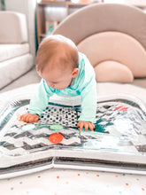Load image into Gallery viewer, Black and white water mat, baby water mat, high contrast water mat, black and white baby toy, tummy time mat, Young wonderer, Young wonderer baby boutique, black and white baby toy, australian baby boutique, high contrast toy, baby toy, tummy time toy, sensory toy, baby sensory, sensory mat
