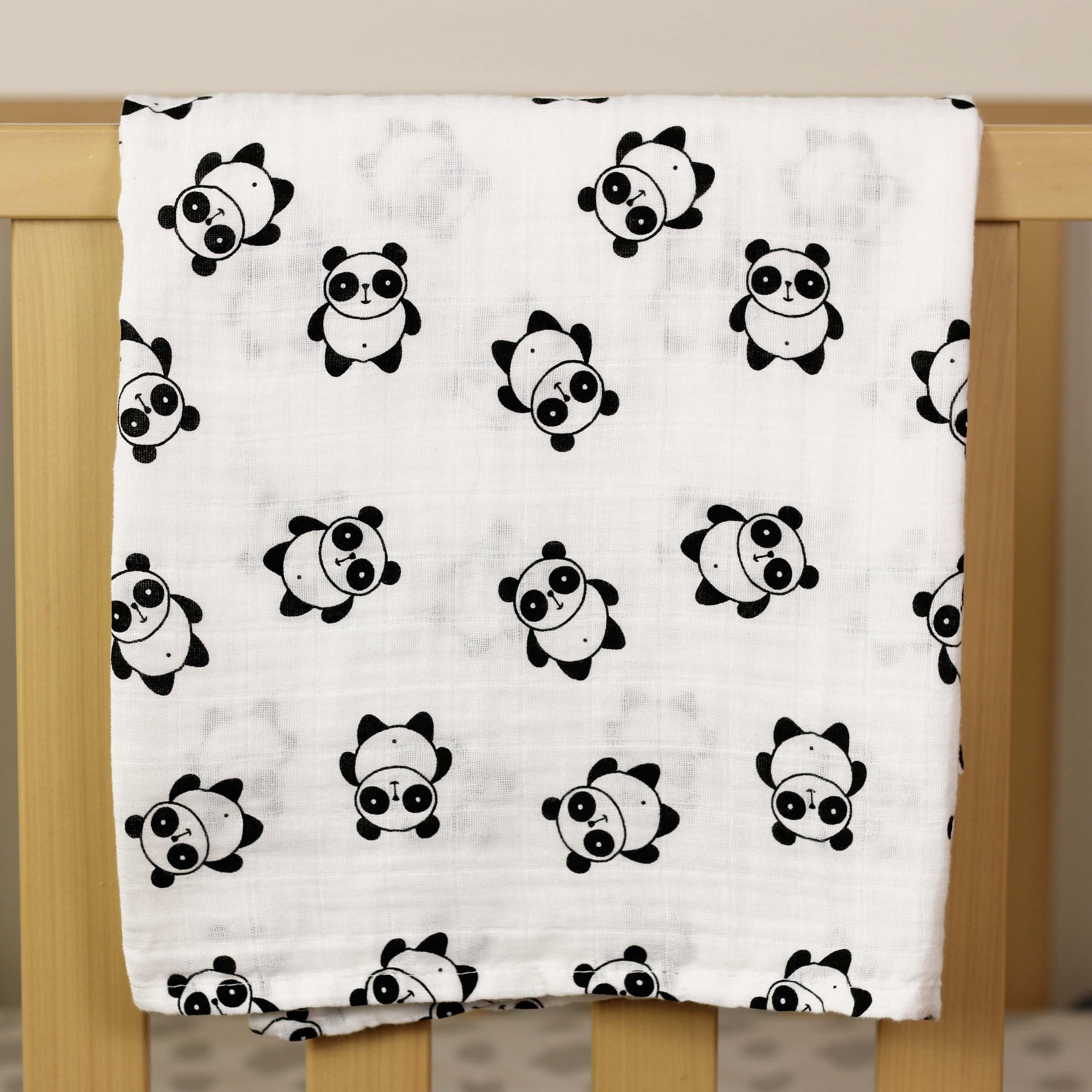black and white muslin, black and white baby muslin wrap, baby muslin wrap, baby muslin australia, baby wrap australia, feather muslin, zebra muslin, panda muslin, snowflake muslin, winter muslin wrap, winter baby wrap, high contrast wrap, high contrast baby, high contrast muslin, Young wonderer, young wonderer baby boutique